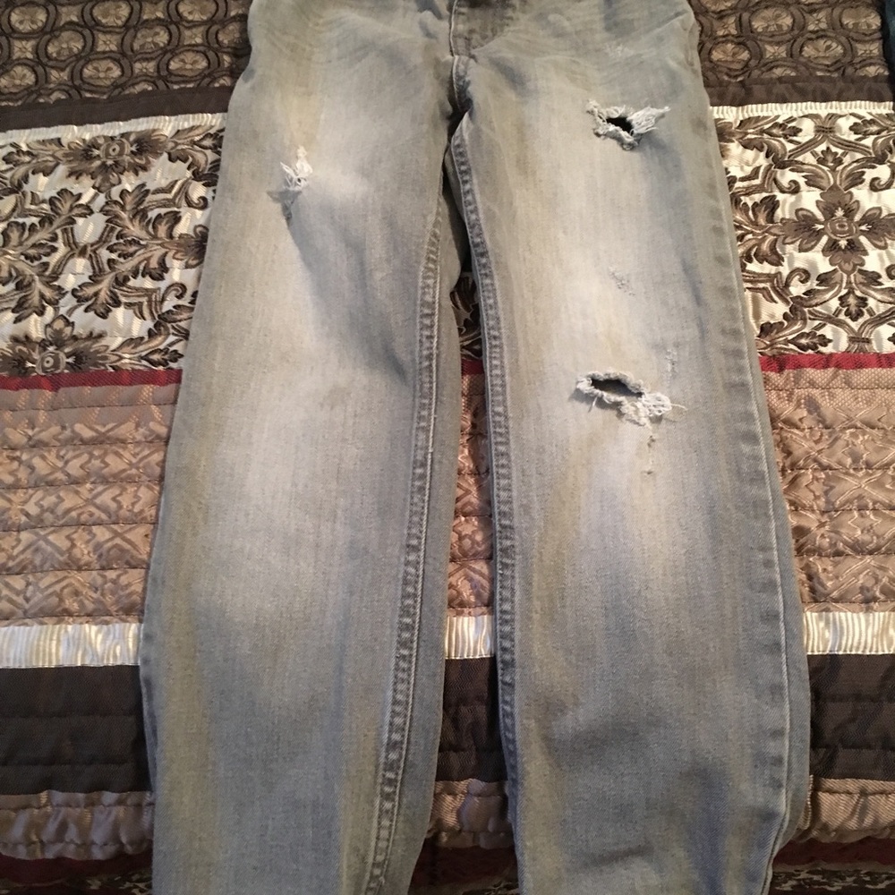 Selling 2 pairs distressed jeans